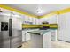 Kitchen featuring stainless steel refrigerator and white cabinets at 70 Juliana Dr, Ellenwood, GA 30294