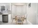 Eat-in kitchen features stainless steel appliances and a bay window for ample light at 1055 Avalon Dr, Lawrenceville, GA 30044