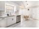 Bright eat-in kitchen boasts stainless steel appliances and room for a breakfast table at 1055 Avalon Dr, Lawrenceville, GA 30044