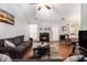 A spacious living room features a fireplace, and a dining area for Gathering meals at 1055 Avalon Dr, Lawrenceville, GA 30044