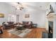 Large living area with vaulted ceilings and fireplace creating a cozy atmosphere at 1055 Avalon Dr, Lawrenceville, GA 30044