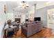 Comfortable living room with hardwood floors, fireplace, and vaulted ceilings at 1055 Avalon Dr, Lawrenceville, GA 30044