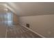 Finished attic featuring neutral paint, plush carpet and ample space at 1555 New Ne St, Atlanta, GA 30307