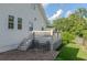Back yard patio and deck featuring classic outdoor chairs and well-maintained landscaping at 1555 New Ne St, Atlanta, GA 30307