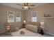 Cozy Bedroom filled with natural light, a charming crib, and delightful decor to create a peaceful environment at 1555 New Ne St, Atlanta, GA 30307