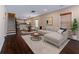 Inviting living room showcases hardwood floors, a neutral palette, and an open-concept layout into the dining area at 1555 New Ne St, Atlanta, GA 30307