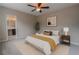 Serene main bedroom boasts calming colors, plush carpets, and an ensuite bathroom for a relaxing retreat at 1555 New Ne St, Atlanta, GA 30307