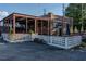 Exterior of restaurant with a covered patio and ample seating at 1555 New Ne St, Atlanta, GA 30307