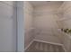 Spacious walk-in closet featuring metal shelving and plush carpeting at 1555 New Ne St, Atlanta, GA 30307