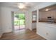The dining area features a ceiling fan, and sliding glass doors to the backyard patio at 3053 Shadow Walk Ln, Tucker, GA 30084