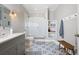 Charming bathroom with a patterned tile floor and a glass enclosed shower at 3045 Moss Stone Lane Sw Ln, Marietta, GA 30064