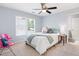 Bedroom with a bright window, neutral carpet, and is decorated with toys at 3045 Moss Stone Lane Sw Ln, Marietta, GA 30064