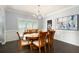 Elegant dining room featuring wainscoting and a chandelier at 3045 Moss Stone Lane Sw Ln, Marietta, GA 30064