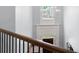 Grand foyer with high ceilings, front door view, chandelier, and hardwood staircase at 3045 Moss Stone Lane Sw Ln, Marietta, GA 30064