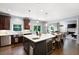 Kitchen with center island, stainless steel appliances, and a view into the living room at 3045 Moss Stone Lane Sw Ln, Marietta, GA 30064