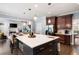 Spacious kitchen with a large center island, pendant lights, and direct access to the Gathering room at 3045 Moss Stone Lane Sw Ln, Marietta, GA 30064