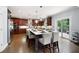 Modern kitchen with a large center island with seating, stainless steel appliances, and wood cabinetry at 3045 Moss Stone Lane Sw Ln, Marietta, GA 30064