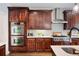 Gourmet kitchen with stainless steel appliances including double oven and hood over gas range at 3045 Moss Stone Lane Sw Ln, Marietta, GA 30064