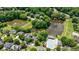 Overhead view of community featuring lake, trees, and a swimming pool area at 4310 Granby Way, Marietta, GA 30062