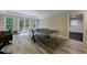 Finished basement with ping pong table, foosball, large windows, and recessed lighting at 4310 Granby Way, Marietta, GA 30062
