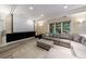 Finished basement featuring home theatre, projector screen, and large comfortable sectional couch at 4310 Granby Way, Marietta, GA 30062