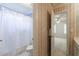 This bathroom features a shower and toilet, with wallpapered walls and access to the bedroom at 4310 Granby Way, Marietta, GA 30062