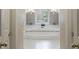Bright, elegant bathroom with a luxurious, large soaking tub and shuttered window at 4310 Granby Way, Marietta, GA 30062