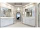 Spacious bathroom with double vanity, white cabinets, and tile flooring at 4310 Granby Way, Marietta, GA 30062