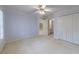 Bedroom with ensuite bath, large closet, neutral walls, and carpeted floor at 4310 Granby Way, Marietta, GA 30062