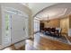 Elegant dining room with hardwood floors, chandelier, and a table set for eight guests at 4310 Granby Way, Marietta, GA 30062