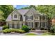 Stately home with elegant architectural details, manicured landscaping, and a welcoming stone pathway at 4310 Granby Way, Marietta, GA 30062