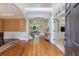 Inviting foyer with hardwood floors, wainscoting, and a view into the living spaces at 4310 Granby Way, Marietta, GA 30062