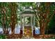 Picturesque gazebo surrounded by trees and overlooking a serene lake view at 4310 Granby Way, Marietta, GA 30062