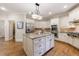 Bright kitchen with stainless appliances, granite island, and custom cabinetry at 4310 Granby Way, Marietta, GA 30062
