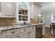 Bright kitchen features granite countertops, stainless appliances, and custom cabinetry at 4310 Granby Way, Marietta, GA 30062