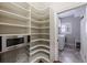 Pantry with shelving, microwave and laundry area at 4310 Granby Way, Marietta, GA 30062