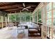 Relaxing screened-in porch with comfortable seating and views of the backyard at 4310 Granby Way, Marietta, GA 30062