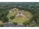 Aerial view of park with baseball and softball fields, surrounded by green space at 10980 Pinehigh Dr, Alpharetta, GA 30022