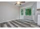 Breakfast area with backyard views, ceiling fan and access to the backyard at 10980 Pinehigh Dr, Alpharetta, GA 30022