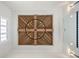 A unique ceiling design featuring wood paneling in a cross pattern and a modern chandelier at 113 Laurel Brook Ln, Canton, GA 30115