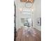 Bright foyer with high ceiling, chandelier, and wood flooring at 113 Laurel Brook Ln, Canton, GA 30115
