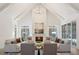 Bright living room with vaulted ceilings and a cozy fireplace at 113 Laurel Brook Ln, Canton, GA 30115