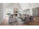 Spacious living room features a fireplace and abundant natural light at 113 Laurel Brook Ln, Canton, GA 30115