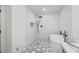 Bathroom with modern fixtures including a soaking tub and shower head at 6486 Aquila Dr, Morrow, GA 30260