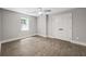 Bedroom featuring grey walls, white trim, and ceiling fan at 6486 Aquila Dr, Morrow, GA 30260