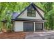 Unique home featuring garage parking and large front window at 6486 Aquila Dr, Morrow, GA 30260
