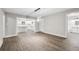 Open-concept living area with view to kitchen and bathroom at 6486 Aquila Dr, Morrow, GA 30260