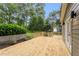 Expansive wooden deck overlooks landscaped backyard and lush garden at 814 S Mcdonough St, Decatur, GA 30030
