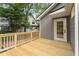 A wooden deck with a view of the backyard and home at 814 S Mcdonough St, Decatur, GA 30030