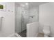 Bathroom with a glass-enclosed shower, modern fixtures, and neutral tiling is both stylish and functional at 814 S Mcdonough St, Decatur, GA 30030